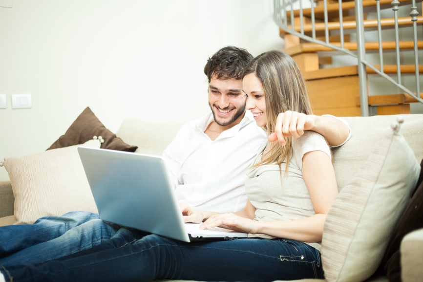 Couple using a notebook florida premarital course